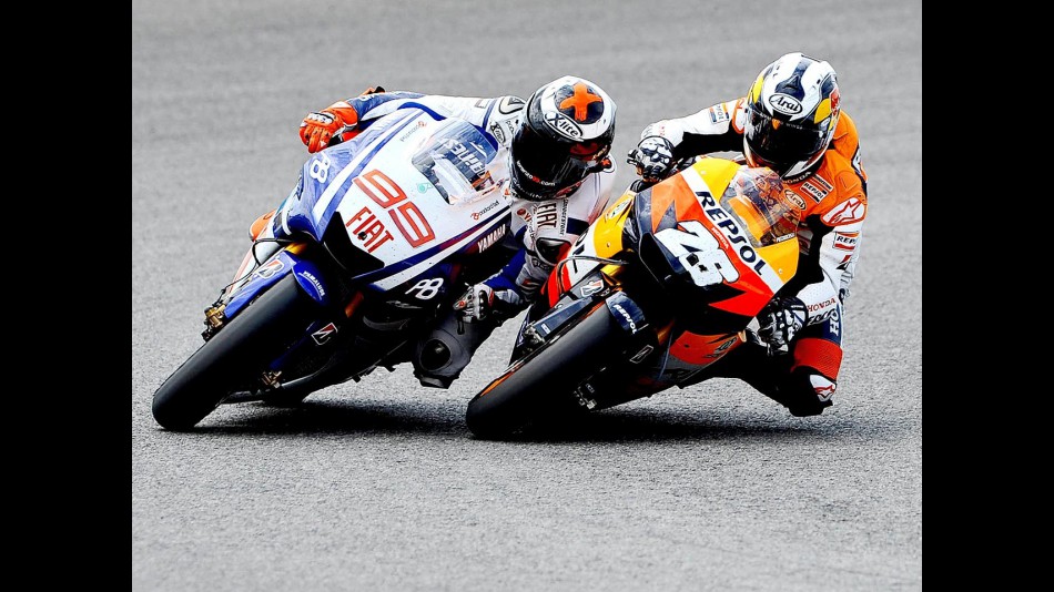 Lorenzo and Pedrosa riding head to head during the race in Jerez