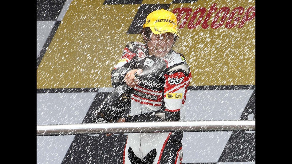 Shoya Tomizawa on the podium in Jerez
