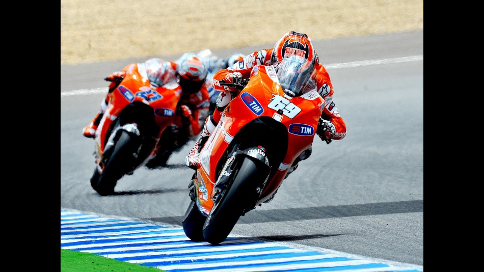 Nicky Hayden riding ahead of Stoner