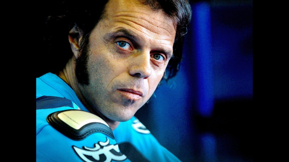 Loris Capirossi in the Rizla Suzuki garage