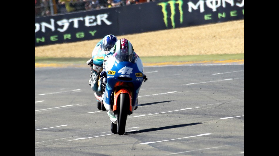 Pol Espargaró riding ahead of Nico Terol at the finish of the race in Le Mans