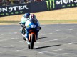 Pol Espargaró riding ahead of Nico Terol at the finish of the race in Le Mans