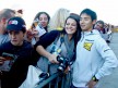 Hiroshi Aoyama attending fans at the paddock in Valencia