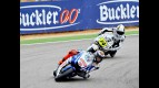 Jorge Lorenzo riding ahead of De Puniet at Motorland Aragón