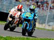 Capirossi and Simoncelli riding head to head during the race in