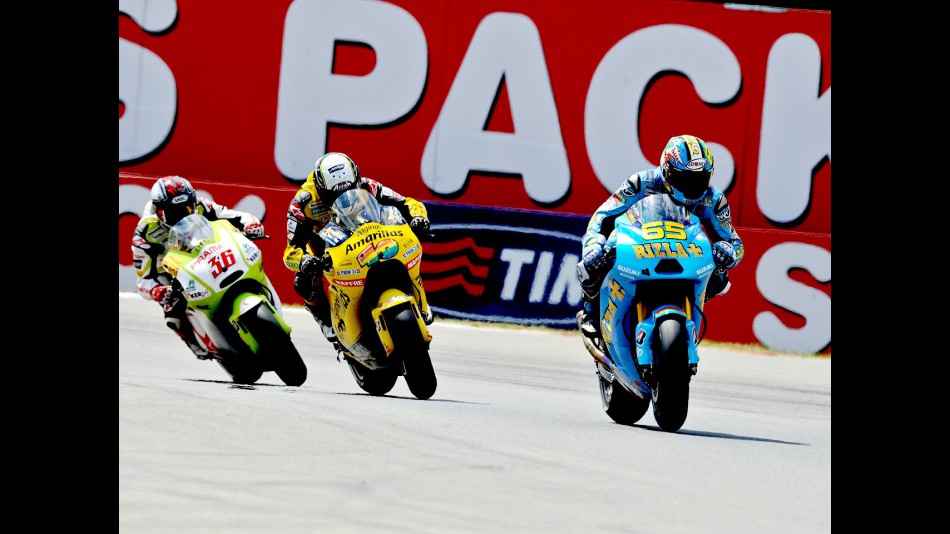 Capirossi riding ahead of Barberá and Kallio in Assen