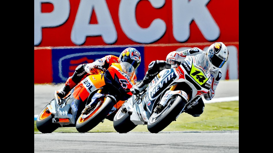 Randy de Puniet riding ahead of Dovizioso in Assen