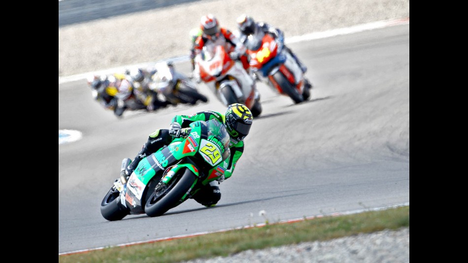 Andrea Iannone riding ahead of Moto2 group in Assen