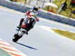 Randy de Puniet pulls off a wheelie during FP1 at the Catalunya Circuit