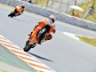 Stoner pulls off a wheelie during FP1 at the Catalunya Circuit