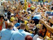 Valentino Rossi attending fans at the paddock in Sachsenring