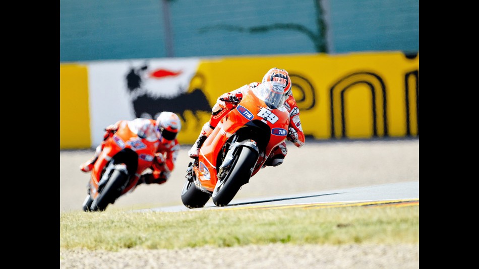 Hayden riding ahead of Stoner during the FP1 in Sachsenring