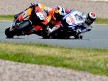 Pedrosa riding ahead of Lorenzo during the race in Sachsenring