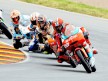 Alberto Moncayo riding ahead of 125cc group in Sachsenring