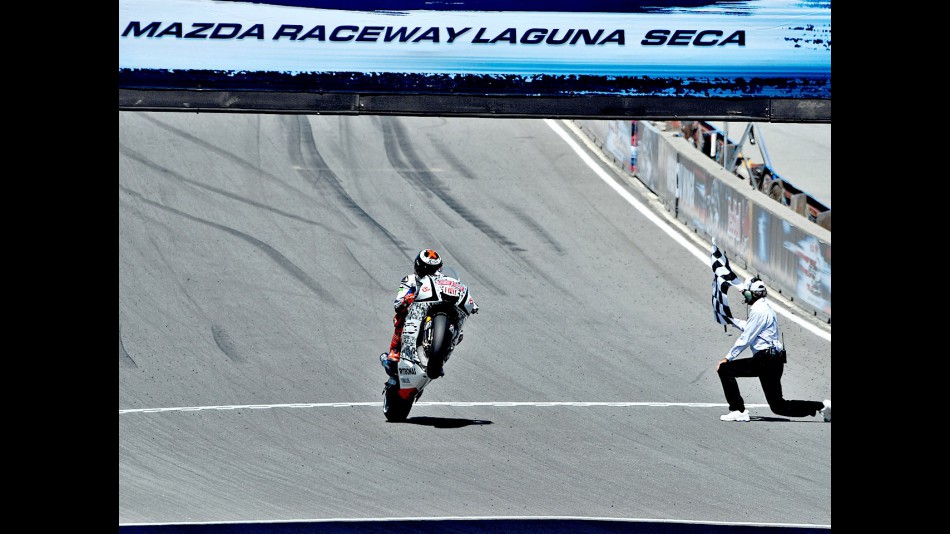 Jorge Lorenzo pulls off a wheelie at the finish of the race in Laguna Seca