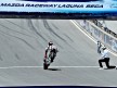 Jorge Lorenzo pulls off a wheelie at the finish of the race in Laguna Seca