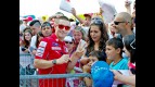 Nicky Hayden attending fans at the paddock in Misano
