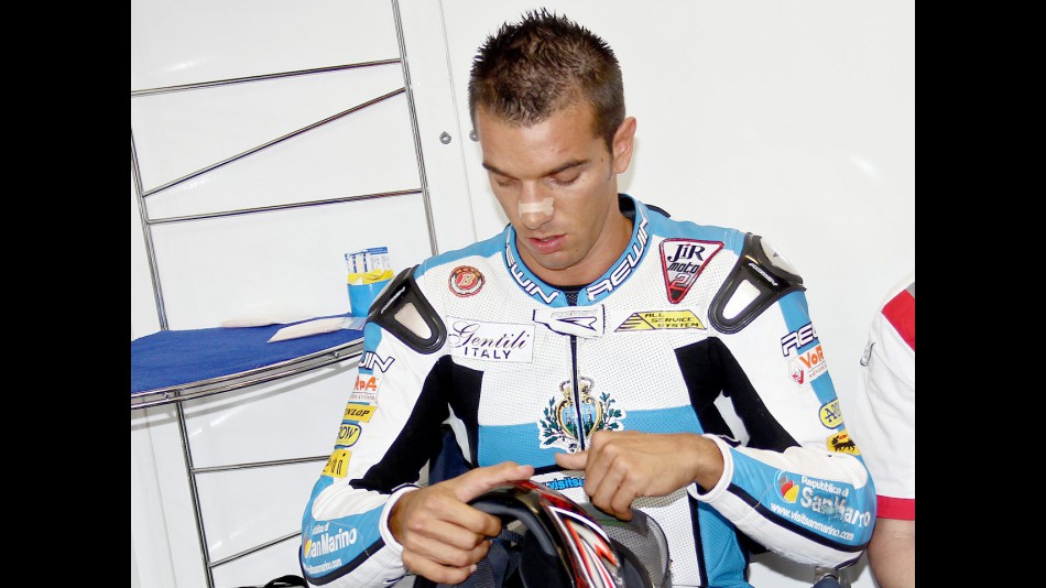 Alex de Angelis in the Jir Moto2 garage