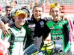 Talmacsi, Boscoscuro and Iannone at the parc fermé after Moto2 race at Motorland Aragón