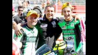 Talmacsi, Boscoscuro and Iannone at the parc fermé after Moto2 race at Motorland Aragón