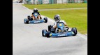 Mika Kallio riding ahead of Corti during the Kart race at Sepang