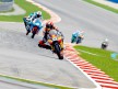 Marc Marquez riding ahead of 125cc group at Sepang