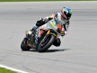 Alex de Angelis in action at Sepang