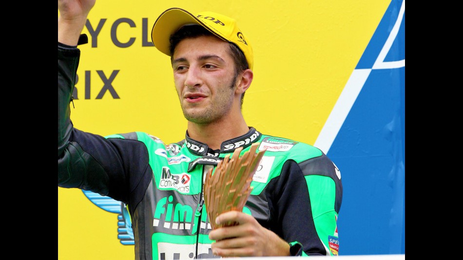 Andrea Iannone on the podium at Sepang
