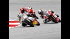 Koyama riding ahead of Salom at Sepang