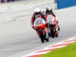 Danny Webb riding ahead of Luis Salom at Sepang