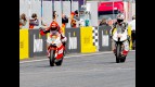 Stefan Bradl finish the Moto2 race ahead of Baldolini at Estoril
