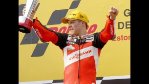 Bradl reviews Estoril win