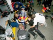 Red Bull Ajo Motorsport staff working on Márquez's bike at Estoril