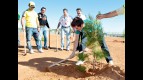 Nico Terol plants tree for the Repsol/MAS foundation