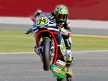 Toni Elías pulls off a wheelie in Valencia