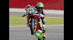 Toni Elías pulls off a wheelie in Valencia