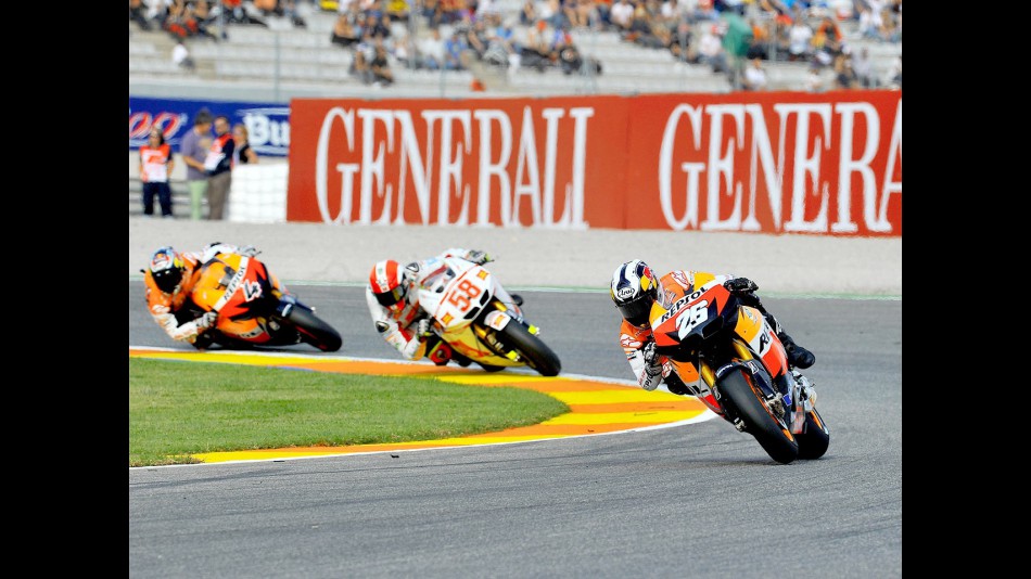 Pedrosa riding ahead of Simoncelli and Dovizioso in Valencia