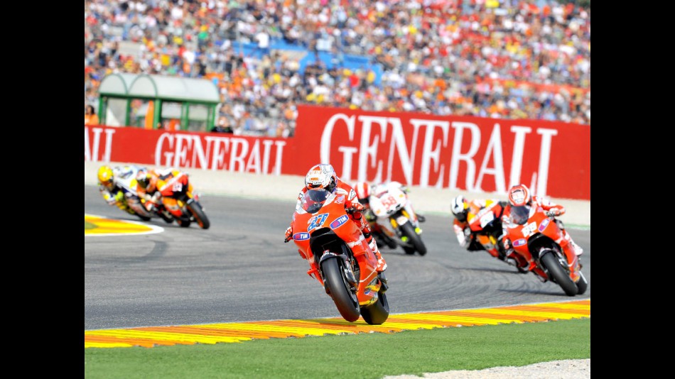 Casey Stoner riding ahead of MotoGP group in Valencia