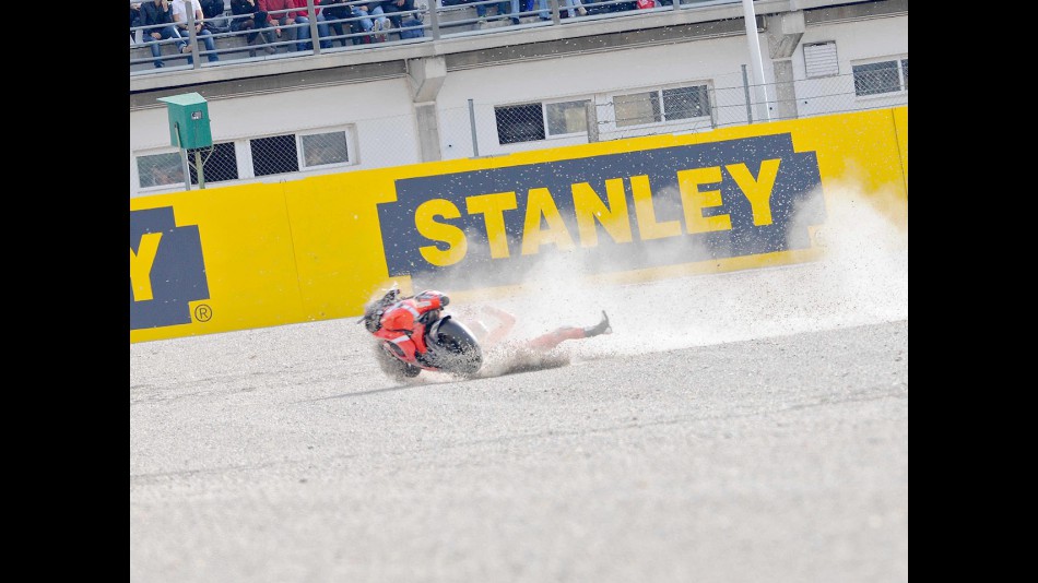 Hayden crashes during the race in Valencia