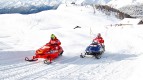 Rossi and Hayden ride snowmobiles at Madonna di Campiglio