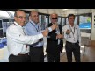 Carmelo Ezpeleta (Dorna Sports CEO), Guy Maitre (FIM Chief Executive Officer), Vito Ippolito (FIM President), Franco Uncini