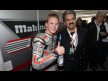 Danny Webb celebrates his pole position with Anand Mahindra