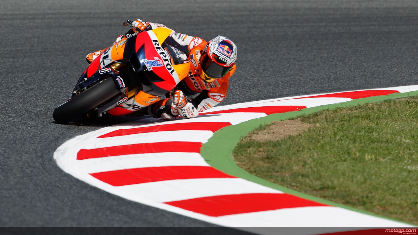 http://photos.motogp.com/2012/06/02/01caseystoner,motogp_0_original.jpg