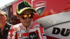 Rossi still struggling with corner entry