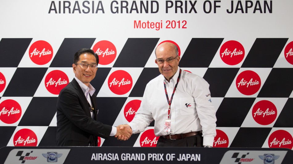 Mobilityland Corp President Hiroshi Soda, Dorna Sports CEO Carmelo Ezpeleta, Motegi