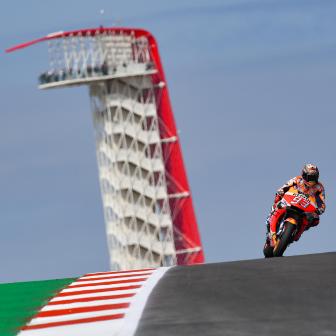 Marquez keeps Rossi at bay to retain COTA qualifying crown