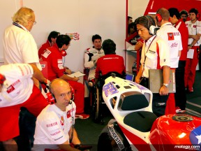 Nicky Hayden with Ducati staff in the garage