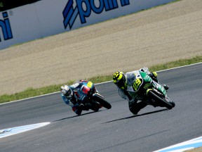 Andrea Iannone riding ahead of Julian Simon during 125cc race in Motegi
