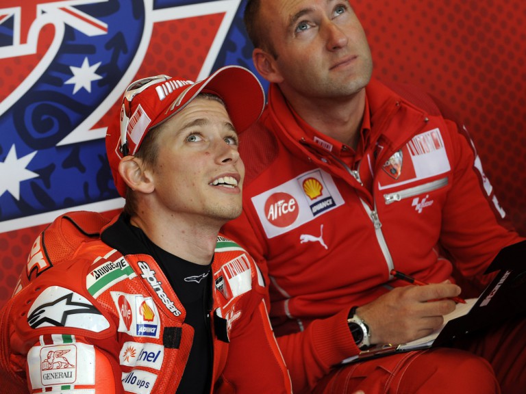 Casey Stoner and his crew chief Cristian Gabarrini in the Ducati Marlboro garage