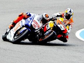 Lorenzo and Pedrosa riding head to head during the race in Jerez